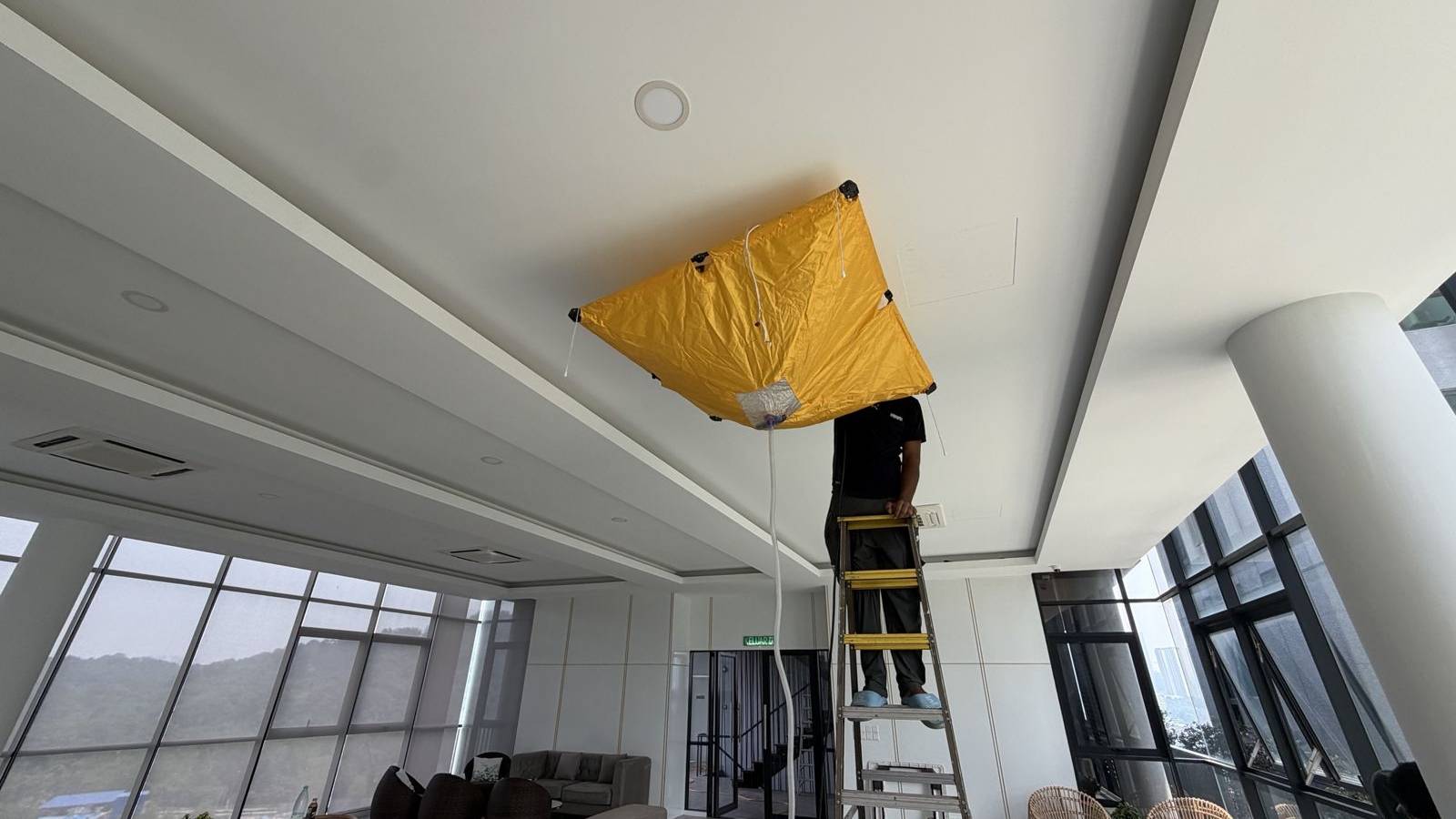 Canvas wash of a ceiling cassette in a condo multi-purpose hall