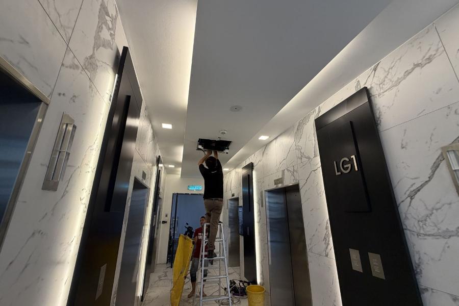 Ceiling cassette aircond cleaning in a condo lift lobby