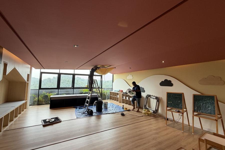 Cassette aircond canvas wash in a condo residents playroom