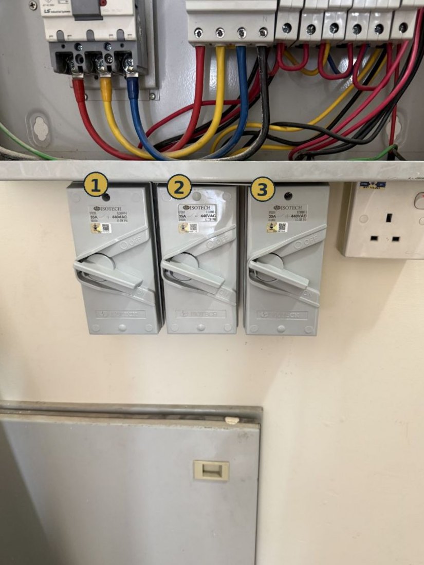 Three labelled isolators, one per outdoor system