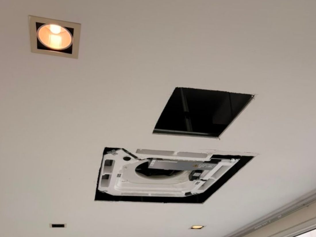 Ceiling cassette frame set into the open lanai ceiling